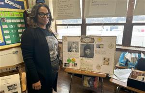  teacher with student work